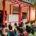 Tanamkan Nasionalisme Sejak Dini, Satgas Yonarmed 13 Ajak Siswa SDN 25 Perimpah Kibarkan Merah Putih